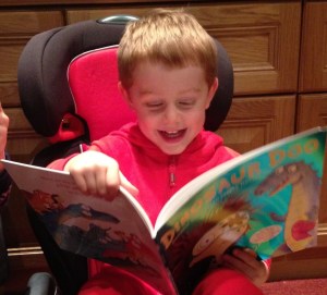 Daniel delighting at Dinosaur Doo